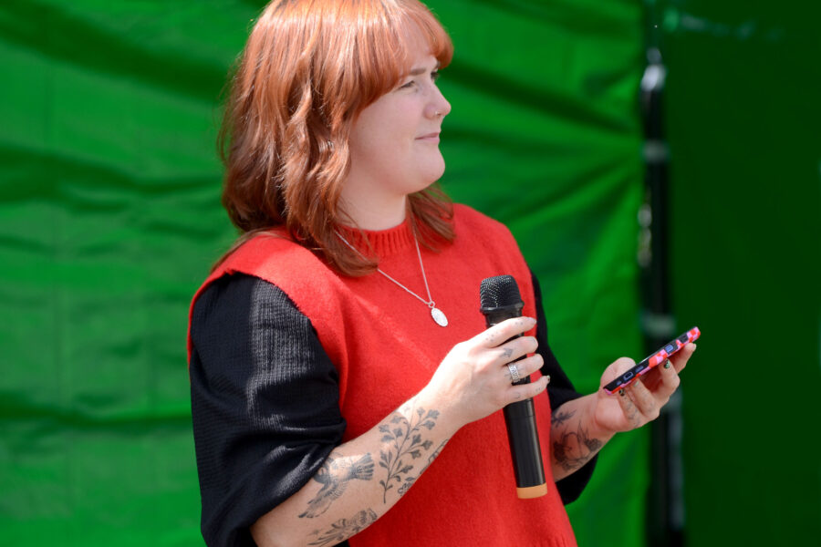 Charlotte White performing at New Street Corner on Honiton Market Charter Day 2025