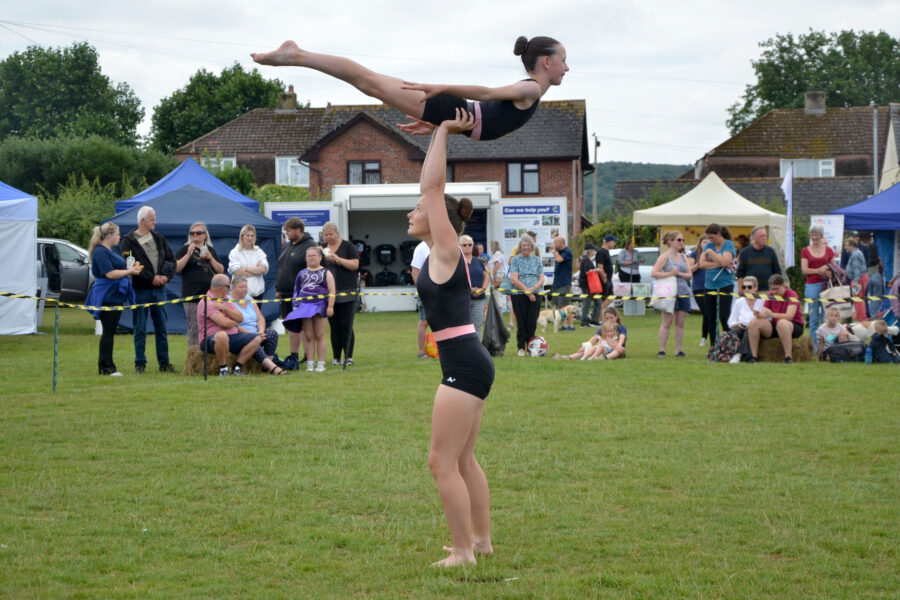 Honiton Gymnastics Club performing in the arena on Allhallows Field on Honiton Market Charter Day 2025