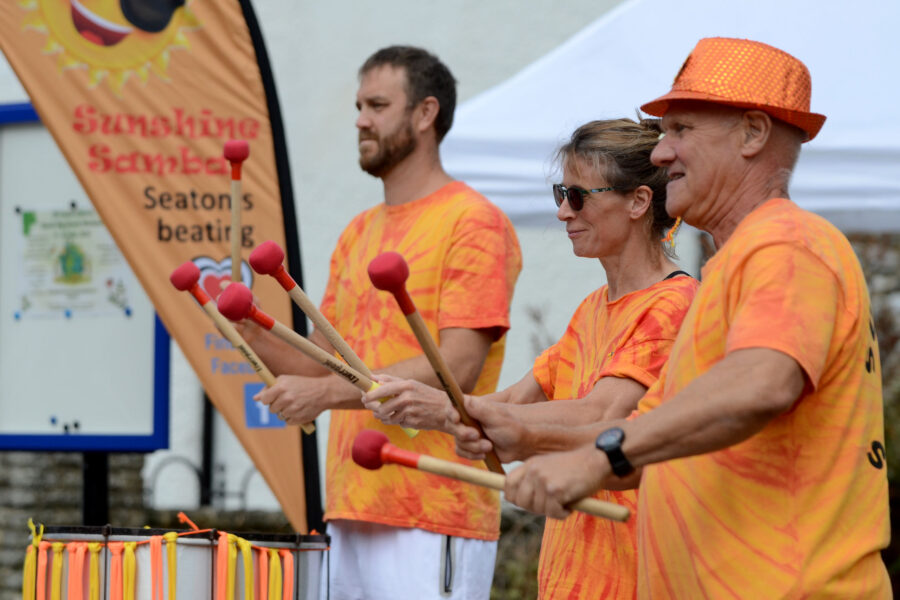 Sunshine Samba performing outside St Paul's Church on Honiton Market Charter Day 2025