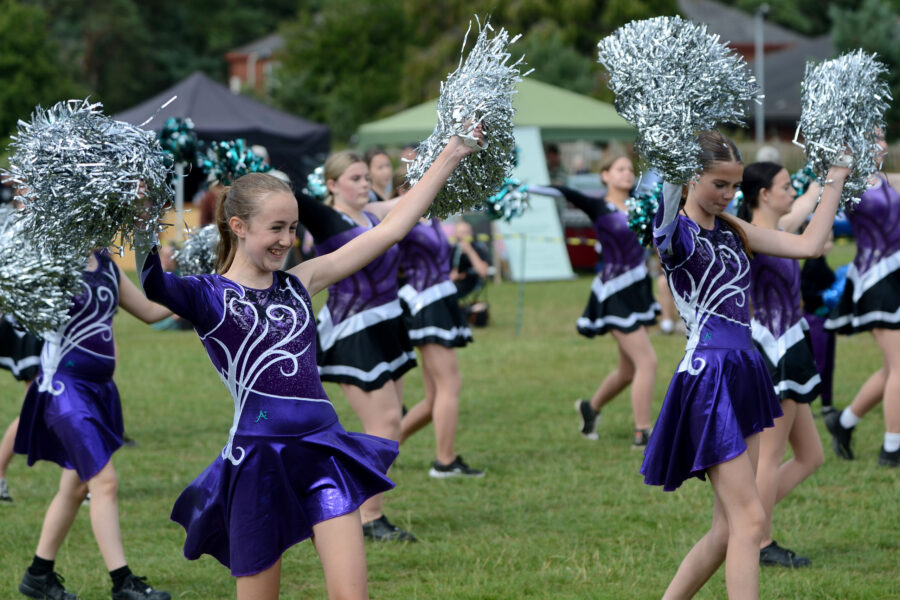 Twirlstars Majorettes performing on Allhallows Field at Honiton Market Charter Day 2025