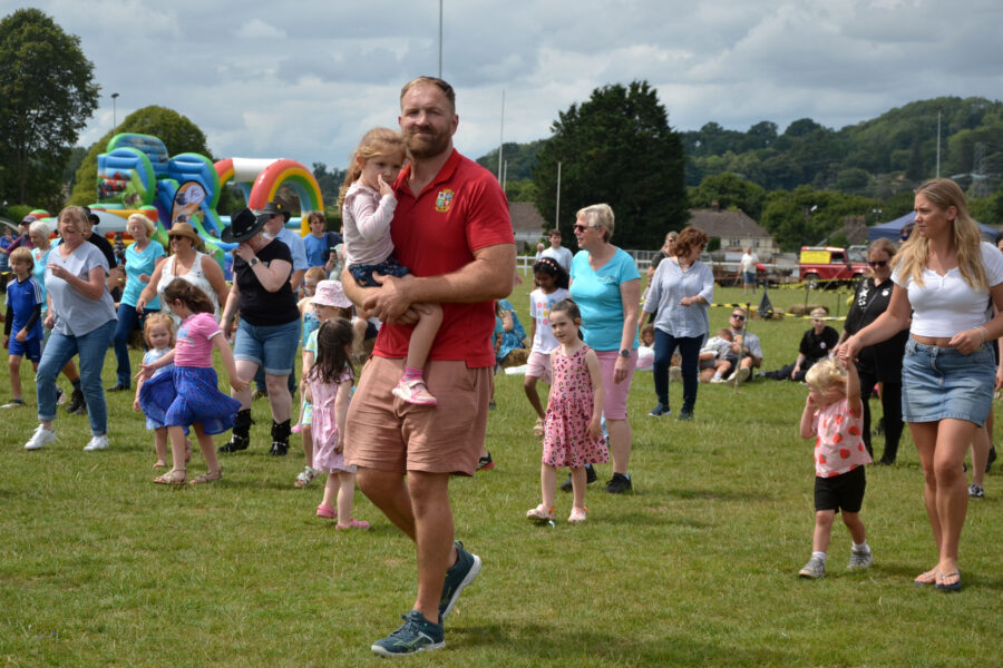 Western Spirit Line Dance Club performing on Allhallows Field at Honiton Market Charter Day 2025.
